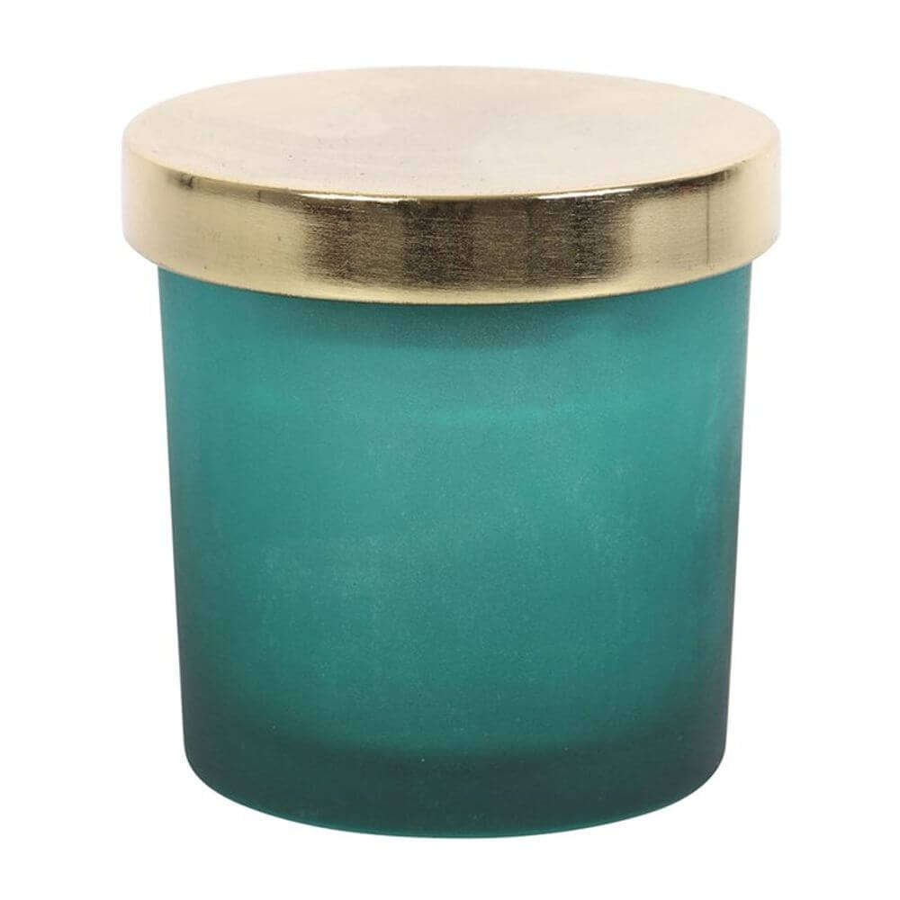 Heart chakra mint crystal chip candle in green frosted glass holder with metallic lid for spiritual alignment and ambiance.