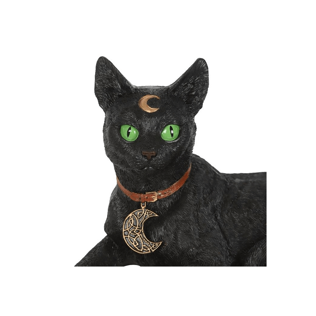 Laying black cat figurine with green eyes and crescent moon collar detail, perfect for home decor and gift ideas.