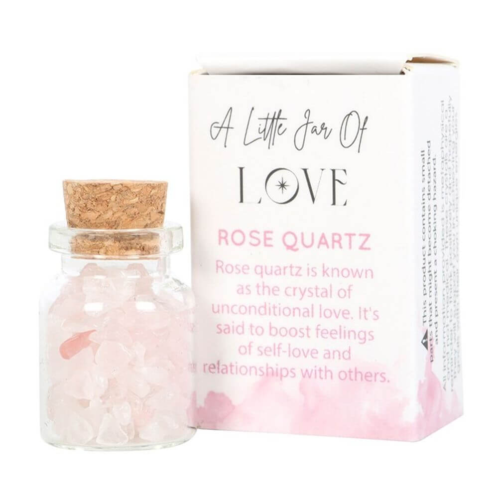 Jar of Love with rose quartz crystal chips in a charming matchbox, promoting unconditional love and healthy relationships.
