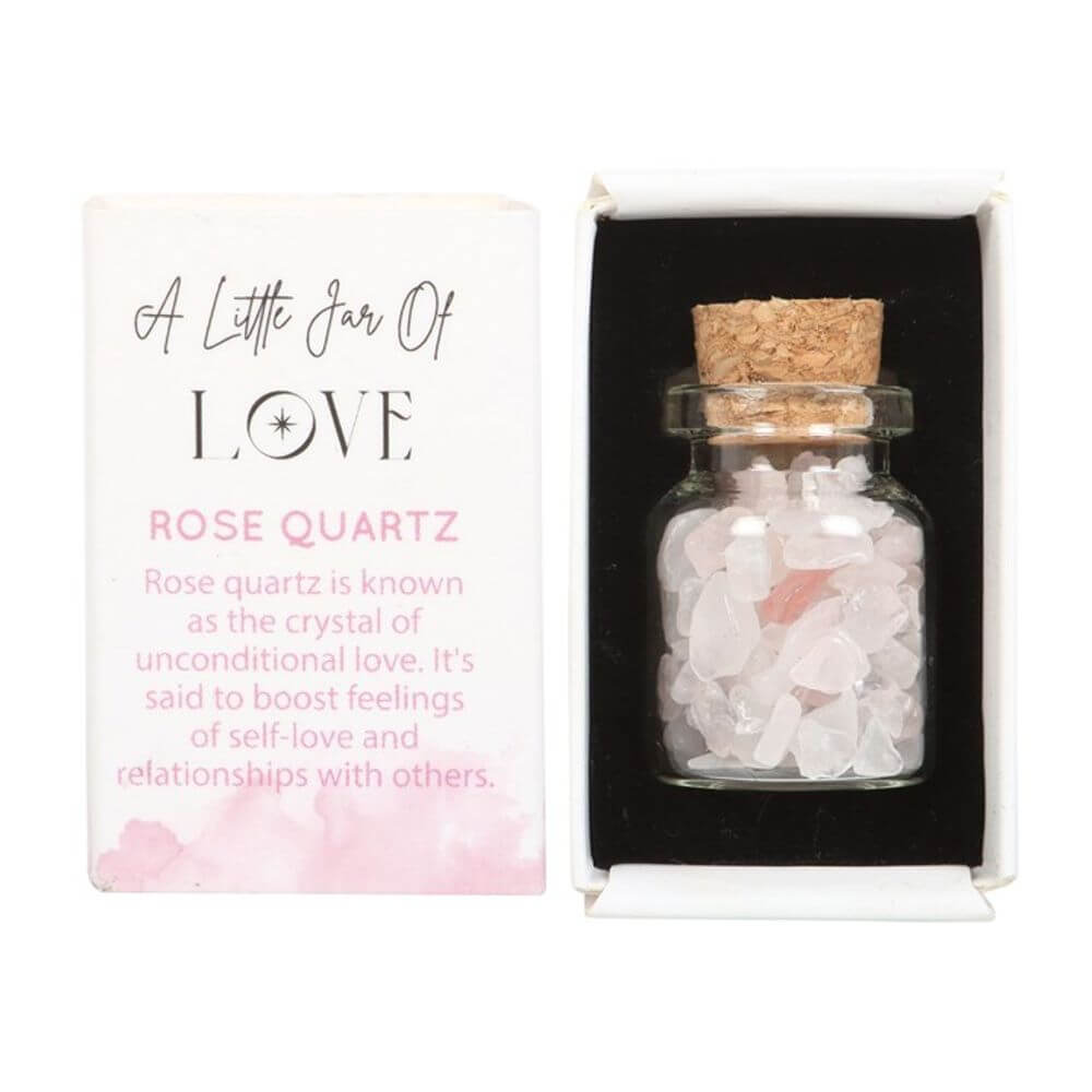 Jar of Love featuring rose quartz crystals in a charming matchbox, promoting love and healthy relationships.