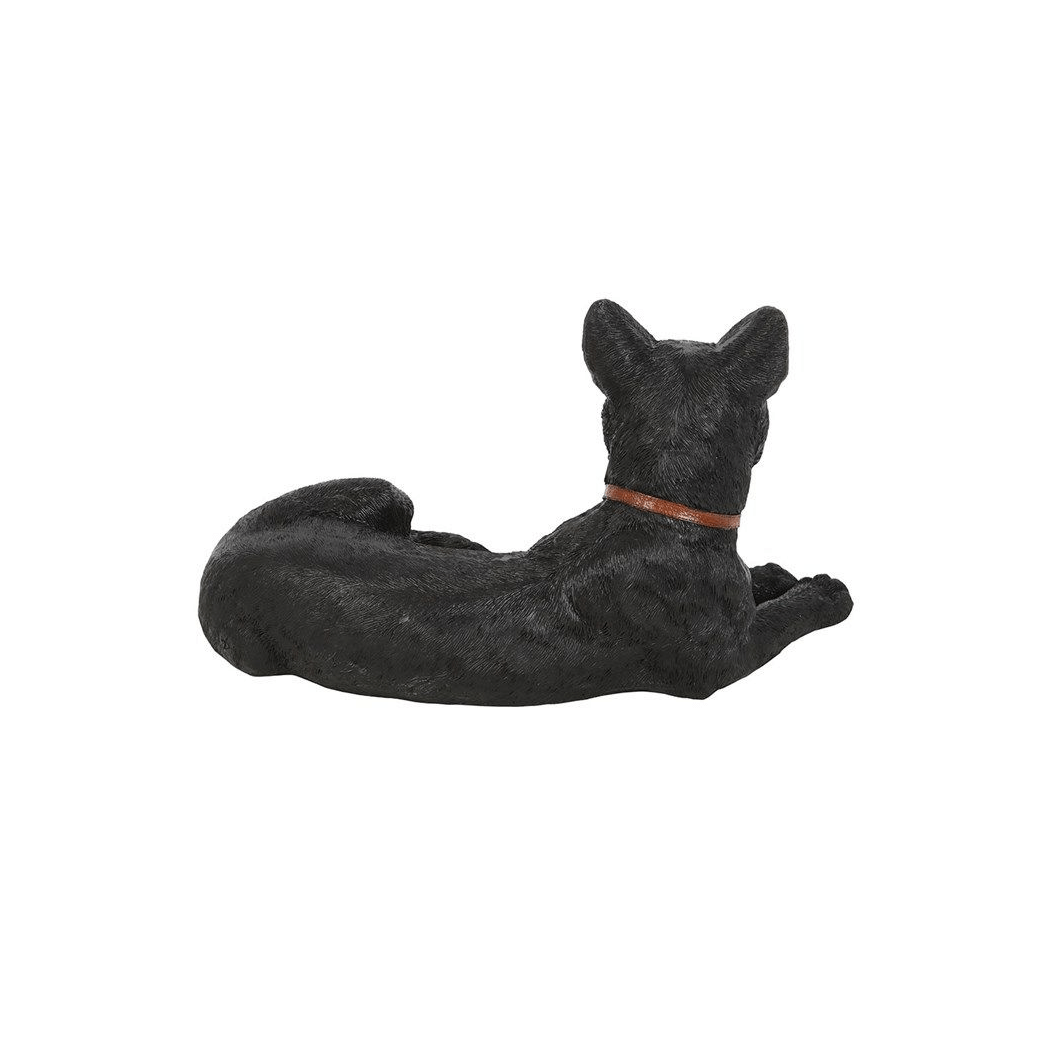 Laying black cat figurine with striking green eyes and crescent moon collar detail, perfect for home decor and gifts.