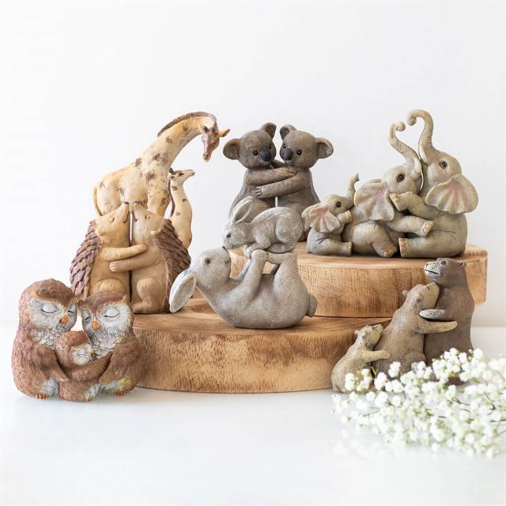various animal ornaments on a wooden stand
